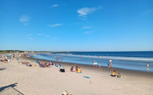 9 Rhode Island Beaches Where You Can Swim, Surf, And Watch The Sunset For Cheap