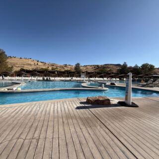 This Historic Oregon Hot Springs Resort Just Reopened With 30 Soaking Pools and a Desert Oasis Feel