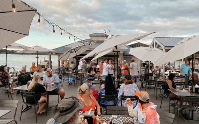 This Laid-Back Tennessee Hangout Sits Out on a Floating Dock Where You Boat Up for Live Music and Cold Drinks