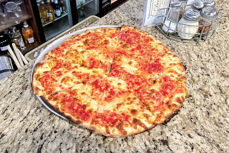 This No-Frills Family-Owned Tavern in Staten Island, New York Serves Charred Thin-Crust Pies Worth the Trip