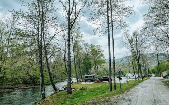 This North Carolina Campground Where You Tube and Swim Right Outside Your Tent