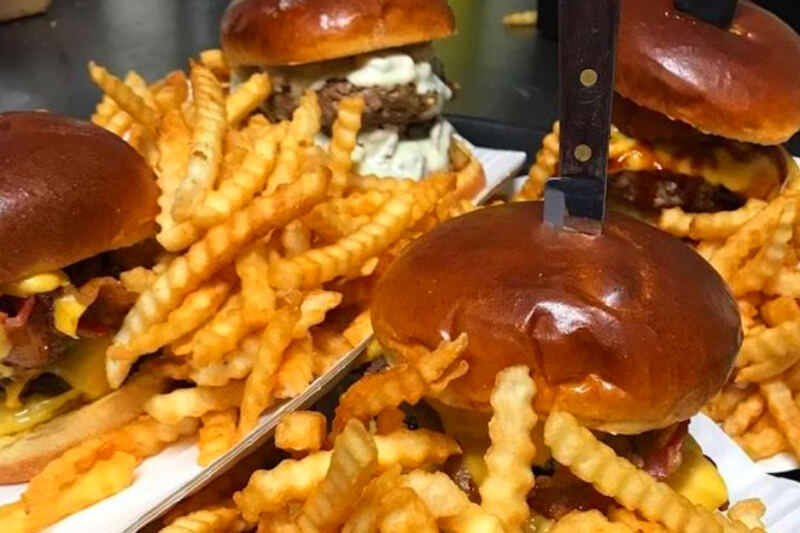 This Small-Town Michigan Tavern Is Famous for Olive Burgers, Fried Bluegill, and Crispy Tater Kegs