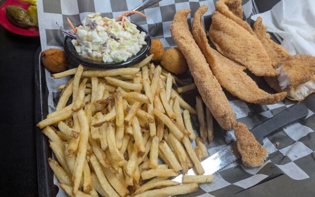 This Roadside Oklahoma Fish House Piles Fried Catfish So High It Arrives on a Cafeteria Tray