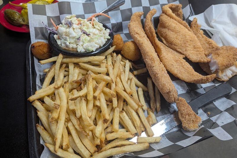 This Roadside Oklahoma Fish House Piles Fried Catfish So High It Arrives on a Cafeteria Tray