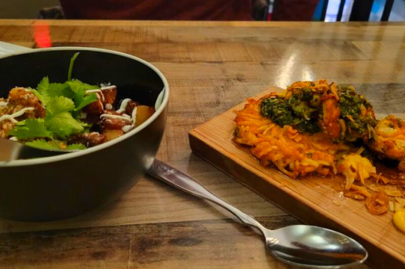 This Coastal Michigan Restaurant Turns Dinner Into a Game Night – With Creative Small Plates and Bocce on the Patio
