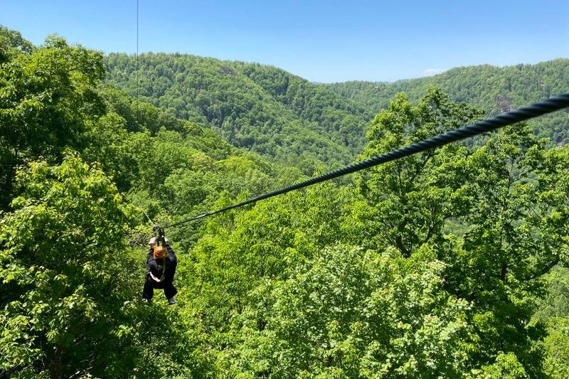 This North Carolina Mountain Zipline Sends You Soaring Above a Waterfall Gorge With the Cable Doing the Flying