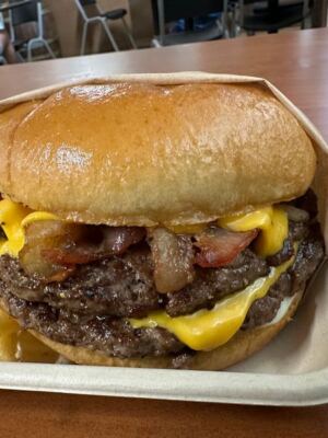 This No-Frills Texas Burger Shack Griddles Old-School Greasy Cheeseburgers That Fill the Whole Wrapper