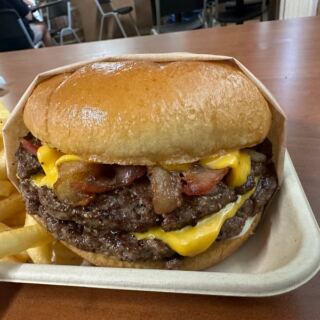 This No-Frills Texas Burger Shack Griddles Old-School Greasy Cheeseburgers That Fill the Whole Wrapper