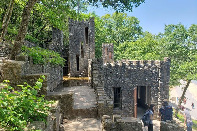 This Mysterious Oklahoma Castle Above a Roaring Waterfall Has Stairs and Caves to Explore