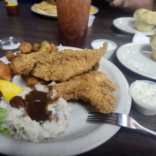 This Off-Highway Oklahoma Fish House Serves All-You-Can-Eat Catfish and Apple Fritters Worth the Drive