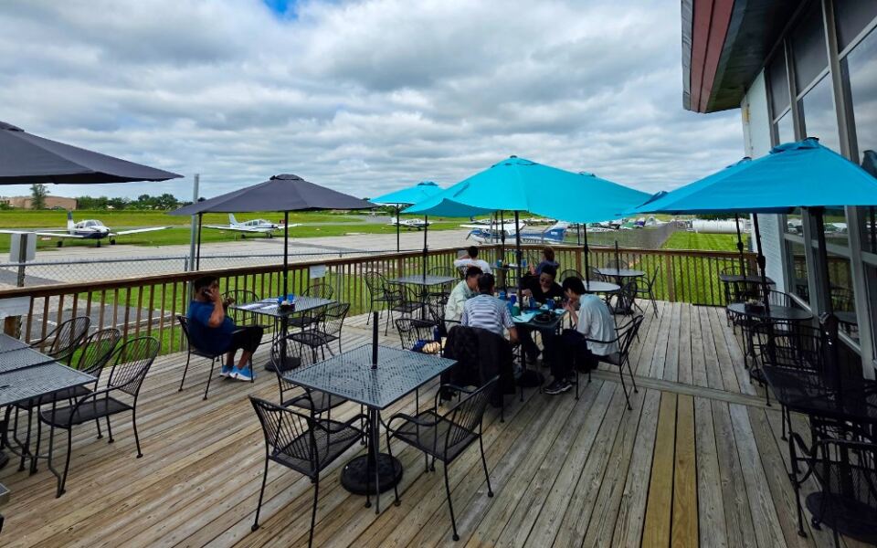 This Little Airport Cafe in Maryland Serves Breakfast on a Deck Where Small Planes Take Off and Land