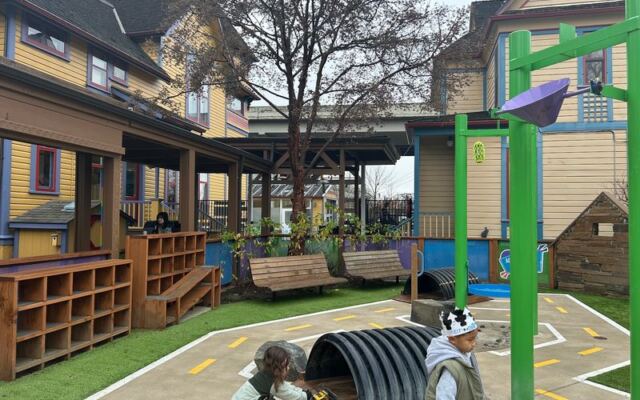 This Oregon Children’s Museum Fills Three Victorian Houses And Hides a Giant Climbing Maze Out Back