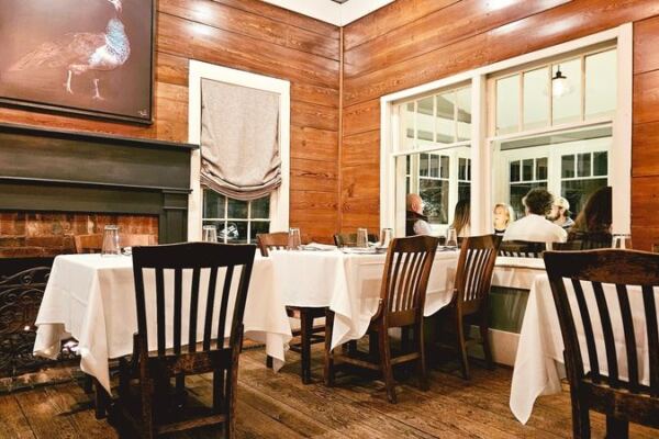 This Georgia Restaurant Serves Romantic Southern Dinners Inside A 150-Year-Old Farmhouse In Atlanta’s Suburbs