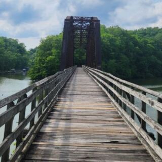 This Tennessee Rail-Trail Follows An Old Railroad Right Across A Wooden Trestle Bridge