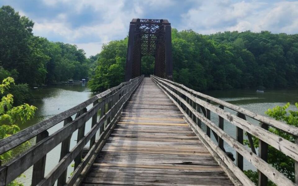 This Tennessee Rail-Trail Follows An Old Railroad Right Across A Wooden Trestle Bridge