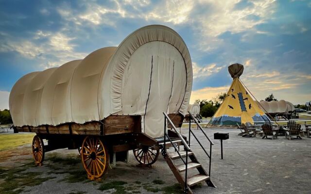 Sleep Under the Stars in an Oklahoma Covered Wagon Where the Only Neighbors Are Coyotes and Constellations