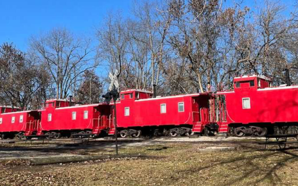 This Illinois Wildlife Park Lets You Sleep in a Caboose Near Bison, Elk, Wolves, and Other Native Animals