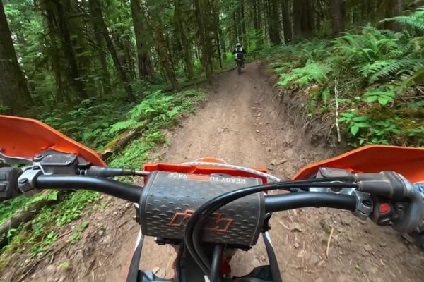 This Oregon Off-Road Park Cuts Dirt Bike And Quad Trails Through A Working Logged Forest Of Slick Red Clay