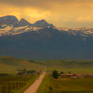 This 69-Mile Idaho Scenic Drive Passes Mountain Towns, Rolling Farmland, and Spectacular Teton Views