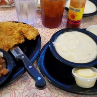 This Family-Owned Coweta, Oklahoma Catfish Joint Brings Out Hush Puppies, Pinto Beans, and Slaw Before Your Fish