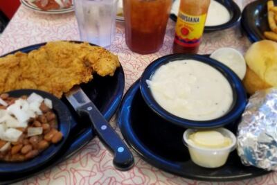 This Family-Owned Coweta, Oklahoma Catfish Joint Brings Out Hush Puppies, Pinto Beans, and Slaw Before Your Fish