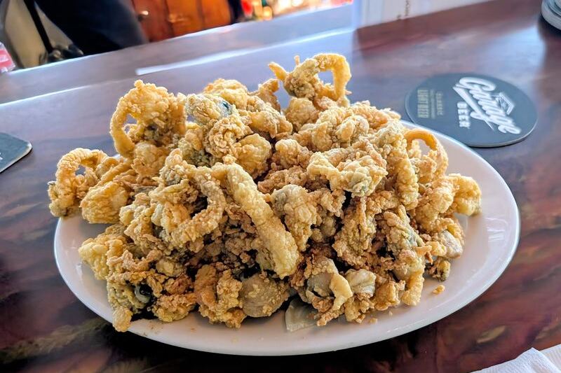 This Unassuming Massachusetts Pub Piles Its Fried Clam Plates So High You Won’t Believe Your Eyes