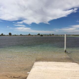 This Crystal-Clear Oklahoma Mineral Beach Hides in the Middle of Nowhere Like a Secret Oasis