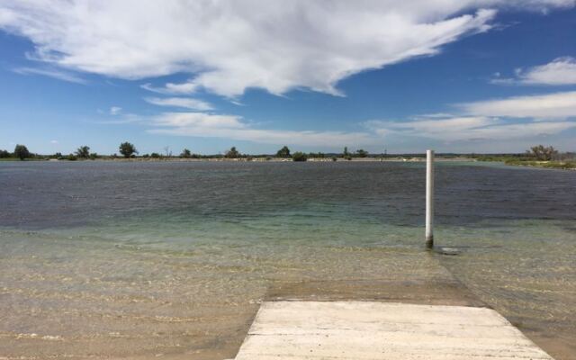 This Crystal-Clear Oklahoma Mineral Beach Hides in the Middle of Nowhere Like a Secret Oasis