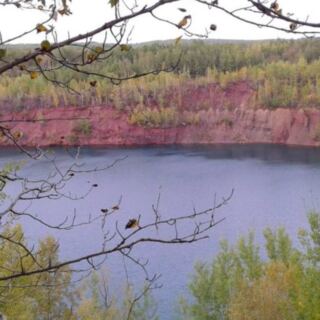 This Minnesota Bike Trail Winds Past Giant Mines And Brilliant Blue Lakes