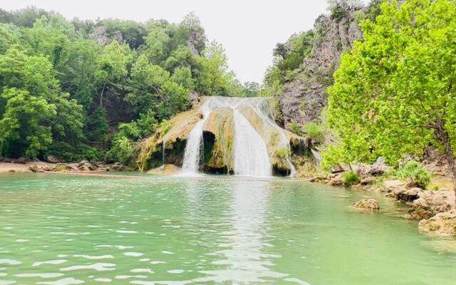Turner Falls Plunges Into a Natural Swimming Pool in Davis, Oklahoma