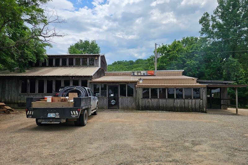 Farm Crews Have Stopped at This Tin-Roofed Shack Near Sallisaw, Oklahoma for Hickory Smoke Since the 1960s