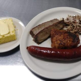Somewhere Near Athens A Roadside Stand Smokes Ribs Under A Cloud You Can Smell For Miles
