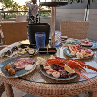 This Waikiki Seafood Buffet Piles On Snow Crab, Oysters, and Fresh Sushi While the Sun Sets Over the Beach