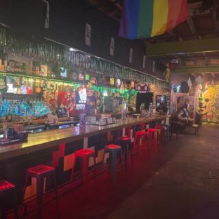 This 1980s-Themed Tulsa Barcade Is Packed With Classic Arcade Games Like Defender And Ms. Pac-Man