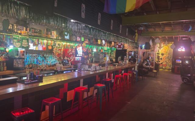 This 1980s-Themed Tulsa Barcade Is Packed With Classic Arcade Games Like Defender And Ms. Pac-Man