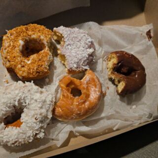 This Tiny Collinsville, Illinois Bakery Has Been Frying Gooey Butter Cake Doughnuts For Decades