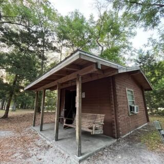 This Rustic Florida Cabin Sits Right Across the Road From a Crystal-Clear Spring