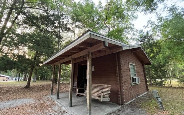 This Rustic Florida Cabin Sits Right Across the Road From a Crystal-Clear Spring