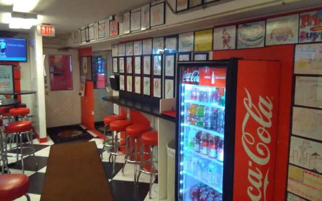 You’d Walk Right Past This Basement Illinois Hot Dog Stand, but Its Made-to-Order Chicago Dogs Keep Fans Coming Back