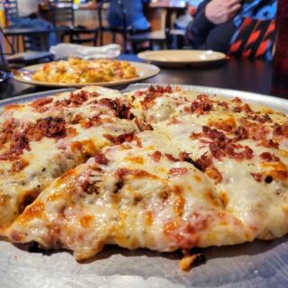 This Cash-Only Small-Town Indiana Tavern Pairs $3 Beers With Crunchy-Crust Pizza Regulars Rave About