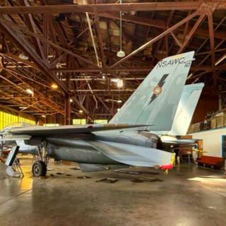 This Kansas Aviation Museum Displays F-14 and F-15 Fighters Inside Two Historic Hangars