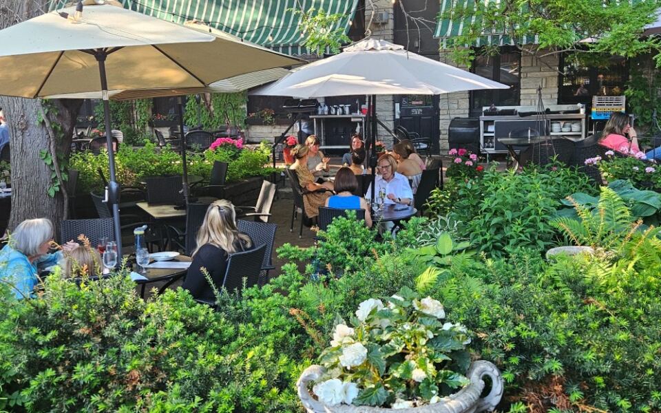 This Minnesota Restaurant Hides A Fairytale Garden Patio Behind An 1889 Building