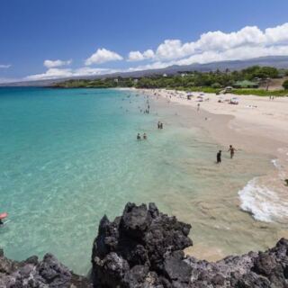 This Hawaii State Park Rolls Out a Famous White-Sand Swimming Beach for the Price of Parking