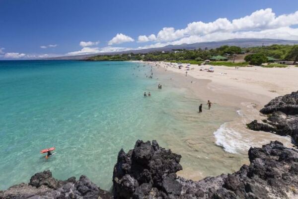 This Hawaii State Park Rolls Out a Famous White-Sand Swimming Beach for the Price of Parking