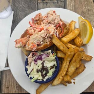 The Best Lobster Roll in New England Is Hiding Inside This No-Frills Massachusetts Seafood Shack Near the Water