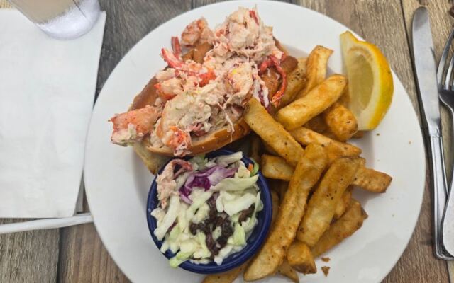 The Best Lobster Roll in New England Is Hiding Inside This No-Frills Massachusetts Seafood Shack Near the Water