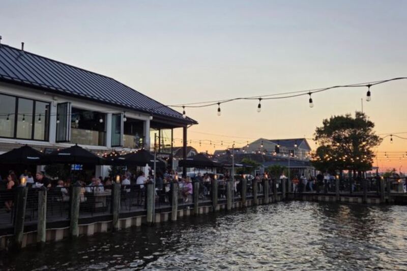 This New Jersey Waterfront Hangout Has Three Bars, Live Music, and Dockside Rocking Chairs