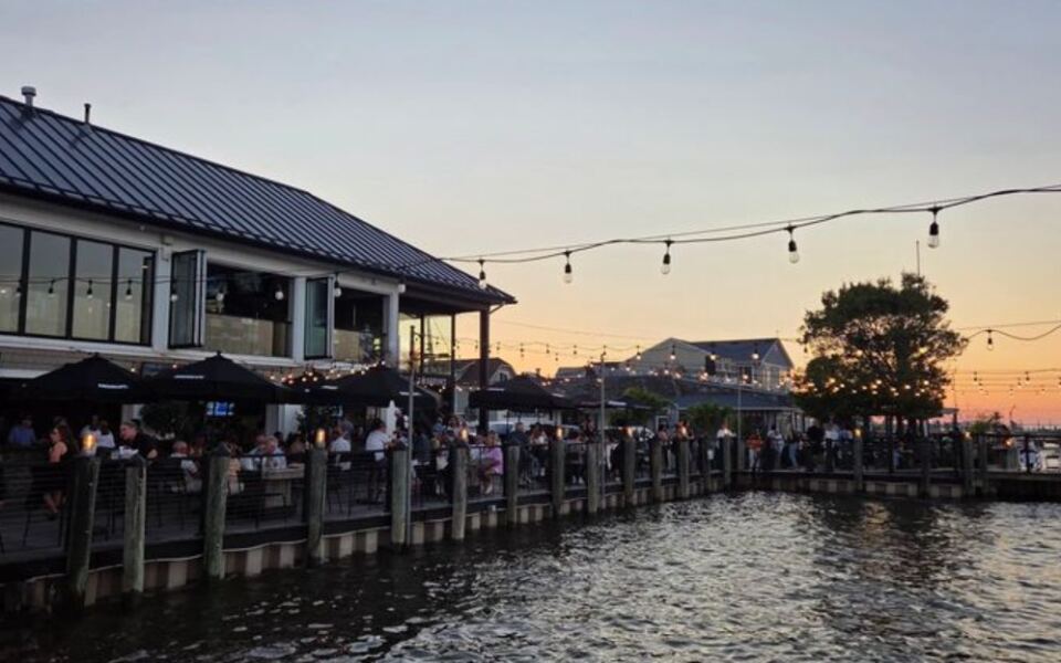 This New Jersey Waterfront Hangout Has Three Bars, Live Music, and Dockside Rocking Chairs