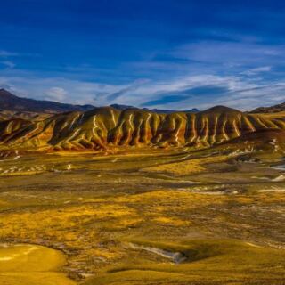 This Remote Oregon Fossil Bed Lets You Walk Among Ancient Painted Rock Layers Millions of Years Old