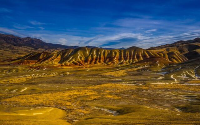 This Remote Oregon Fossil Bed Lets You Walk Among Ancient Painted Rock Layers Millions of Years Old